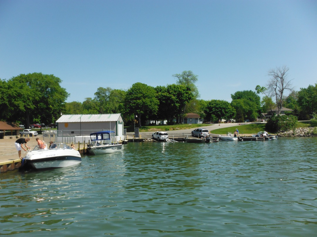 This is the boat ramp and dock at Catawba Island. ODNR rangers put in here
    as well; note the ODNR shed toward the center left. In the background,
    vehicles queue up to set their boats into the water. To the right of this
    image is the Catawba Island Club harbor.