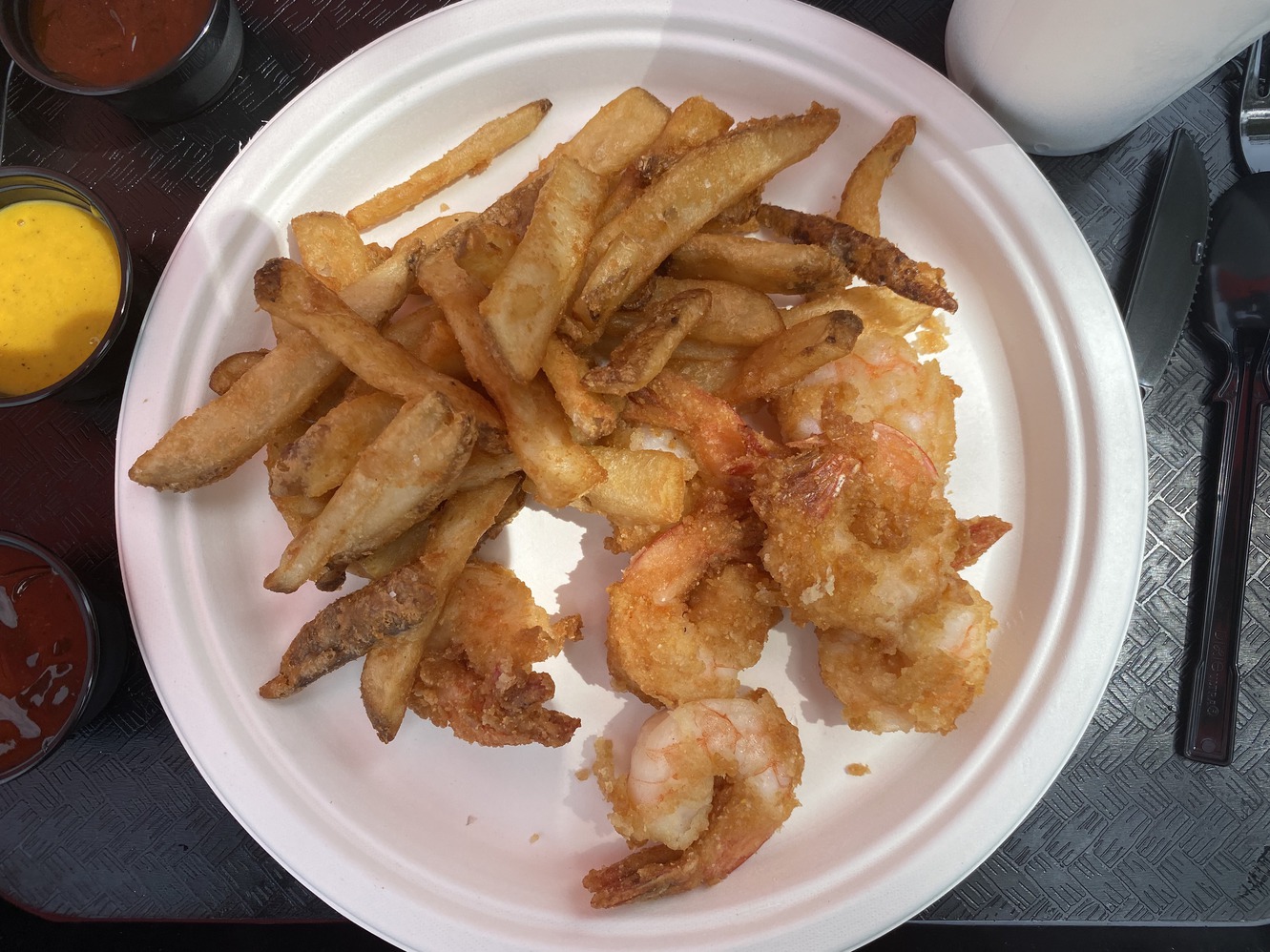 Fried shrimp and fries eaten near Breakers Bay.
