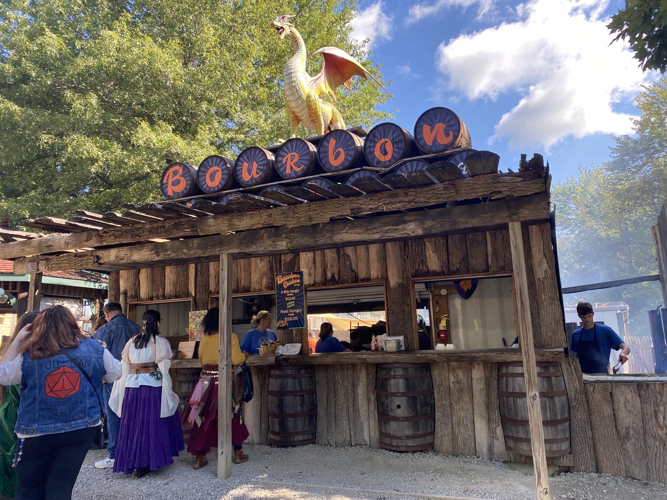 This food stand sells chicken and rice lunches.