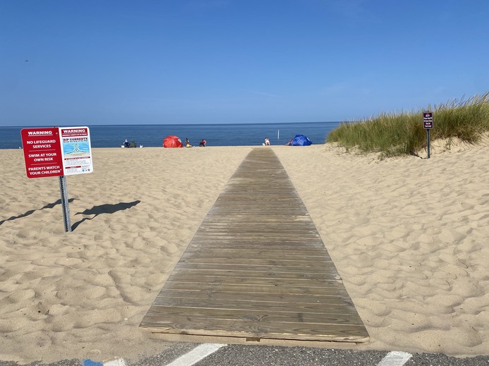 The boardwalk at Oval Beach looks new.